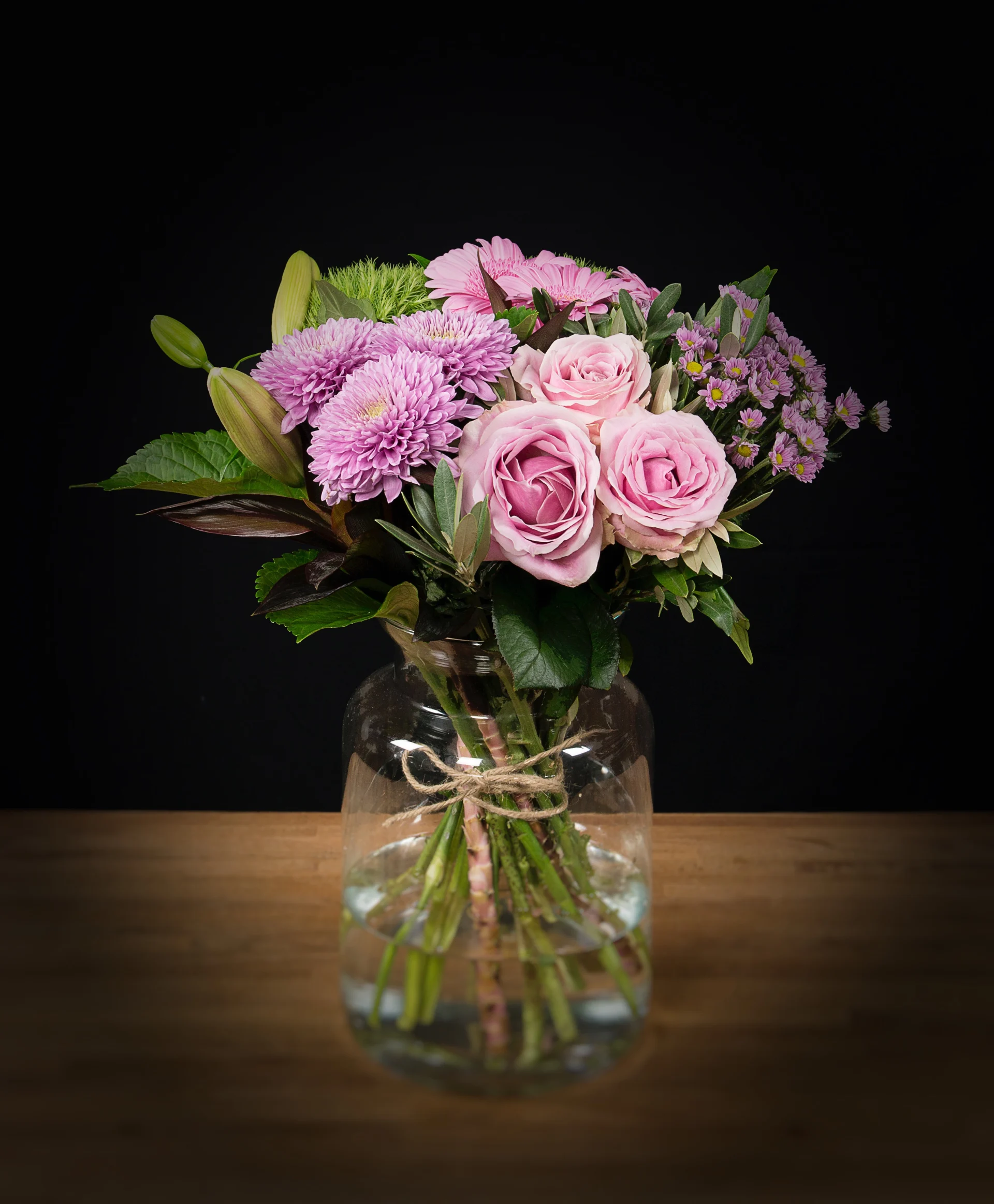 Boeket Pinkie, een boeket met verschillende soorten roze bloemen.